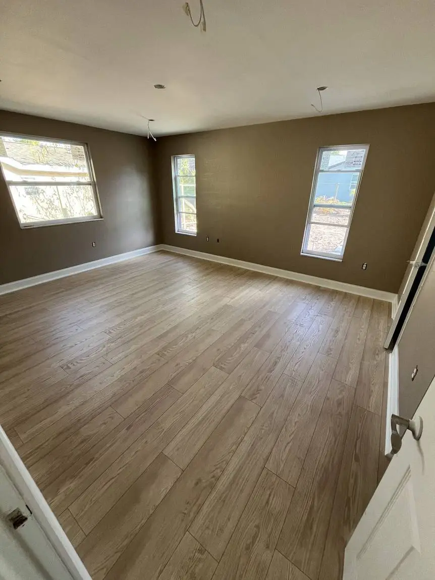 Wood-look plank tile flooring in a Lakeland FL bedroom